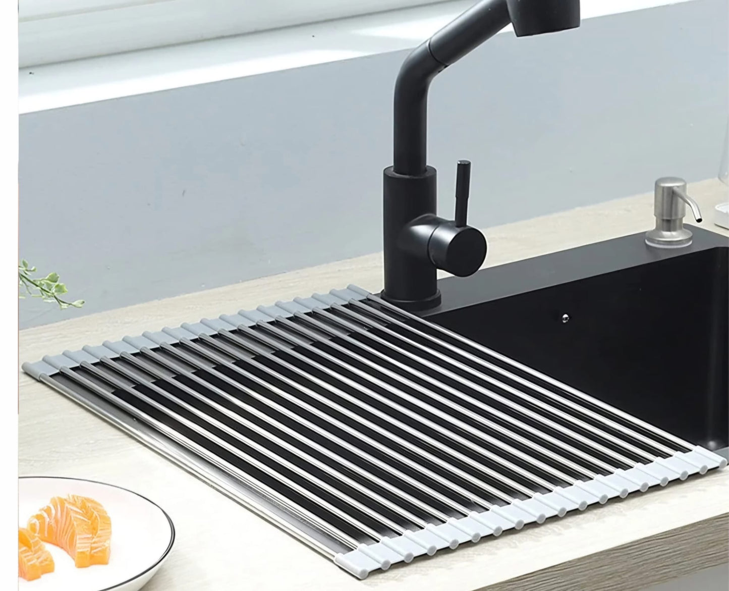 Scolapiatti arrotolabile per lavello