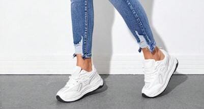 Jeans strappo in caviglia